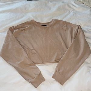 Cropped nude crew neck with rips